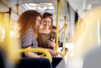 Two women in public transport